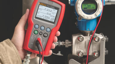 New Dual-Range Pressure Calibrator for Gas Custody Transfer Measurements in Intrinsically Safe Environments