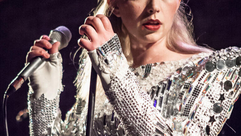 Why is Charlotte Church Serenading Shell?