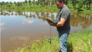 Hydrocarbon Detector Measures Rural River After Oil Spill Incident Involving a Diesel Truck